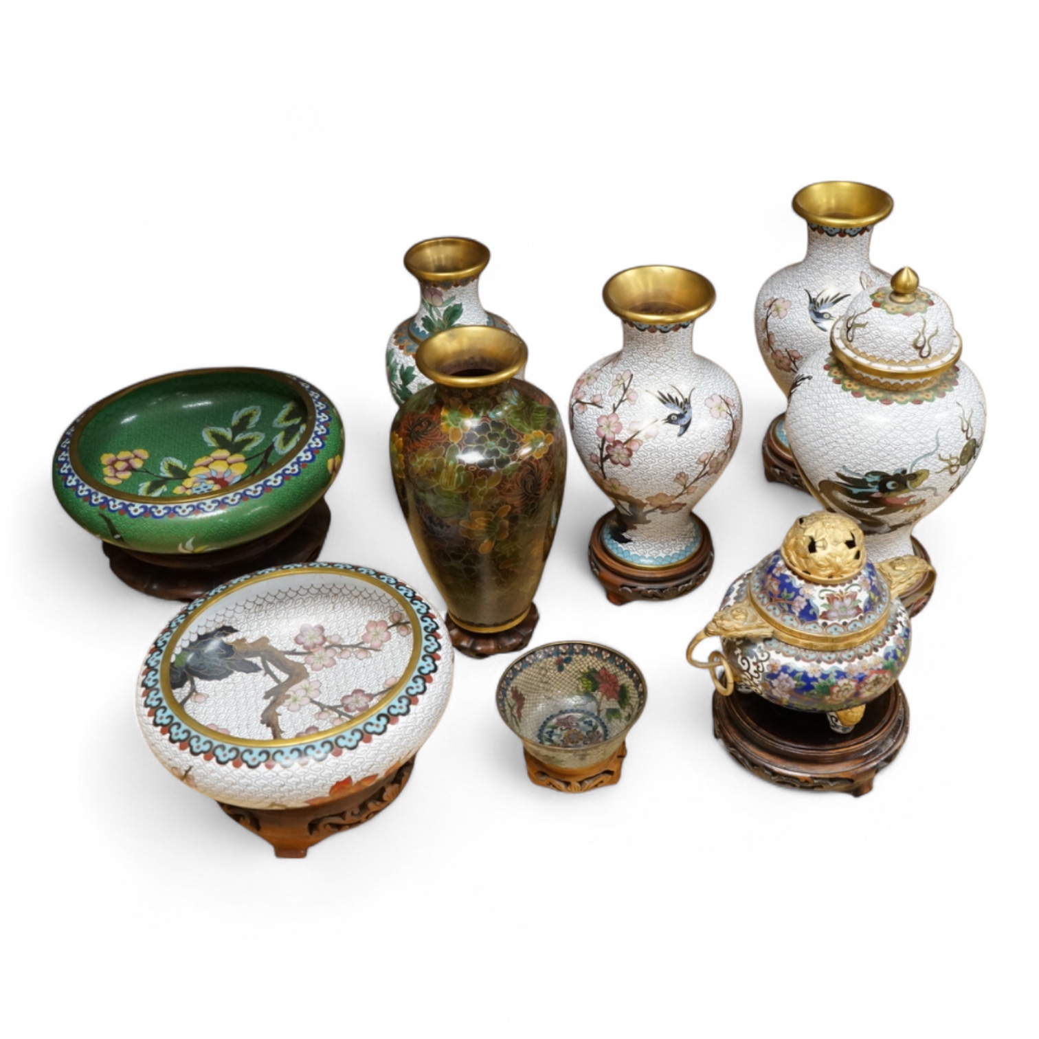 A plique a jour enamel tea bowl together with a collection of cloisonné enamel vases, bowls etc., tallest 26cm